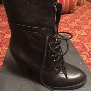 Black lace up and zipped up boots